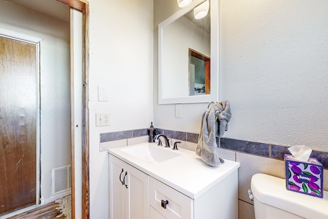 6284 State Highway 55, Mountainair, NM 87036 - bathroom with vanity and wood finished floors