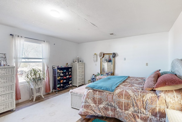 6284 State Highway 55, Mountainair, NM 87036 - bedroom featuring wood finished floors