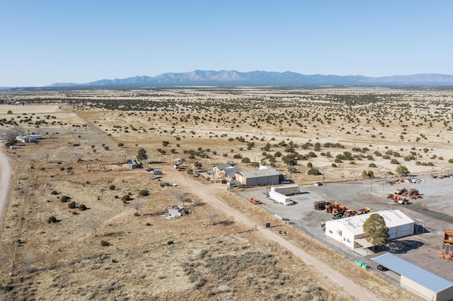 6284 State Highway 55, Mountainair, NM 87036 - aerial view of sparsely populated area with a mountain backdrop
