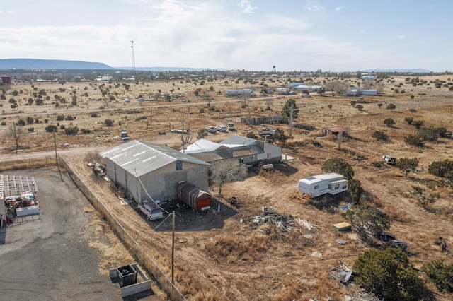 6284 State Highway 55, Mountainair, NM 87036 - aerial view of sparsely populated area with a desert landscape and a mountain backdrop