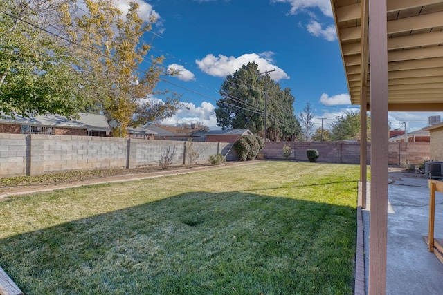 view of yard with central AC