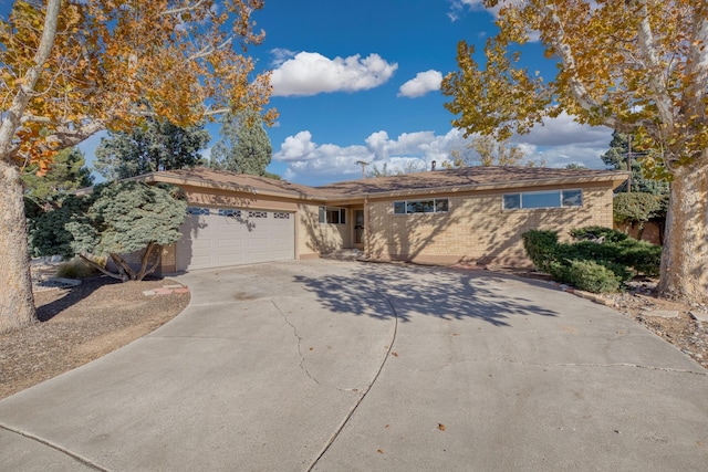 single story home featuring a garage