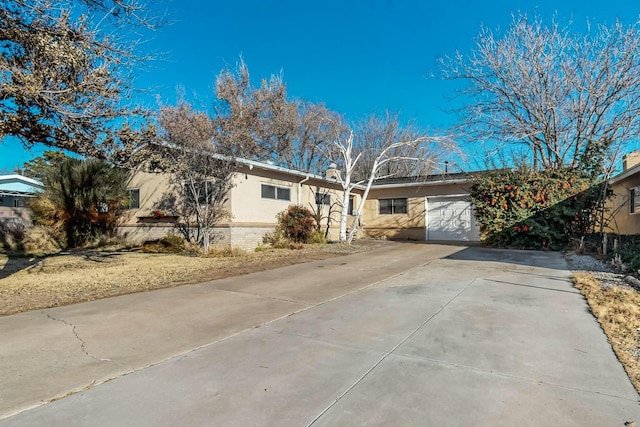 ranch-style house with a garage