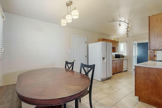 dining room featuring light tile patterned flooring