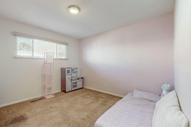 bedroom with light colored carpet