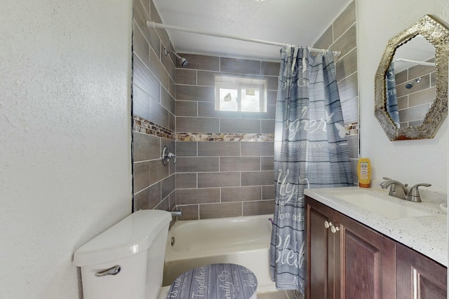 full bathroom with vanity, toilet, and shower / bath combo with shower curtain