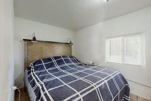 bedroom with a textured ceiling