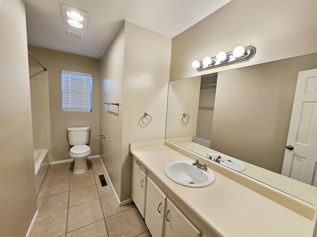 full bathroom with tile patterned flooring, vanity, bathtub / shower combination, and toilet