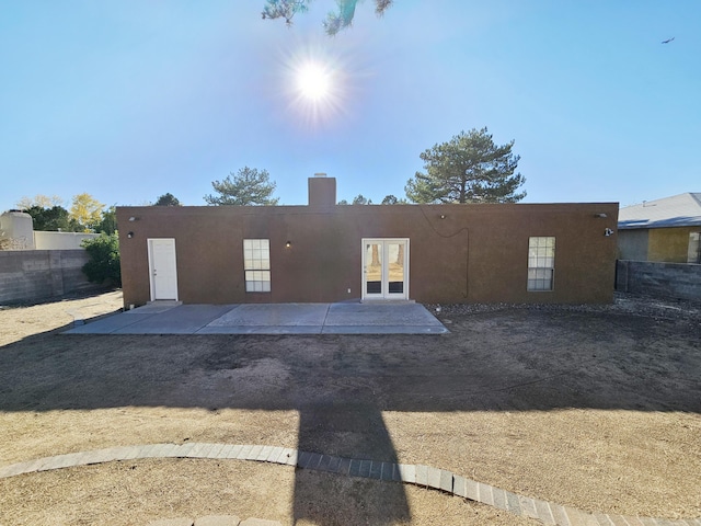 back of house featuring french doors and a patio area