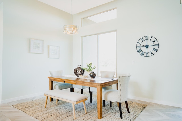 dining area with light parquet floors