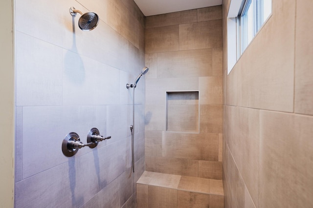 bathroom featuring a tile shower