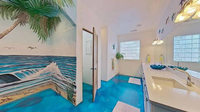 bathroom featuring visible vents and vanity