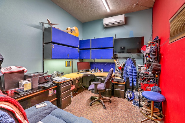 office area with a wall mounted air conditioner and a textured ceiling