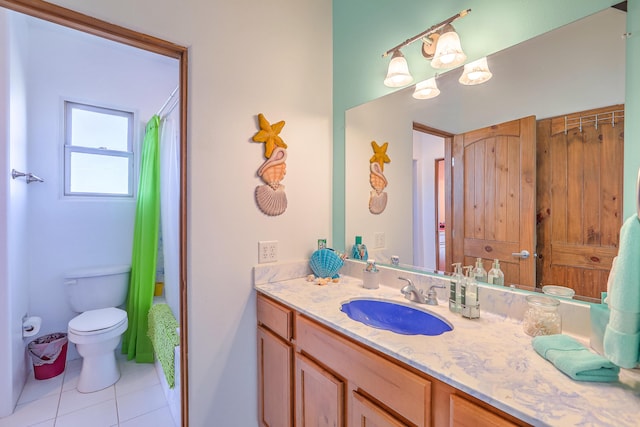 full bathroom with a shower with shower curtain, vanity, toilet, and tile patterned floors