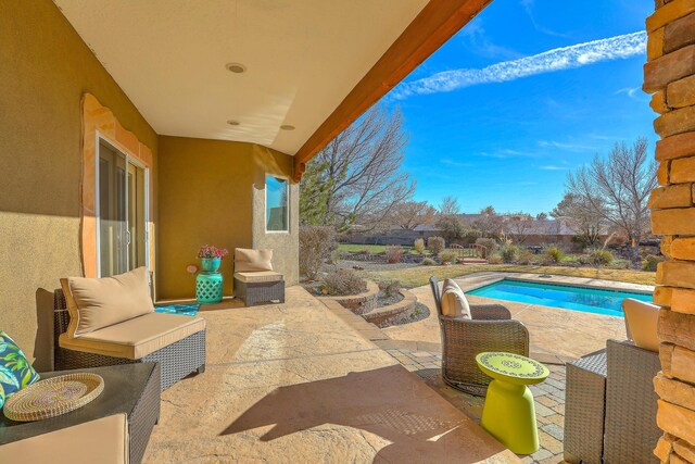 view of swimming pool featuring a patio area, a fenced backyard, and a fenced in pool