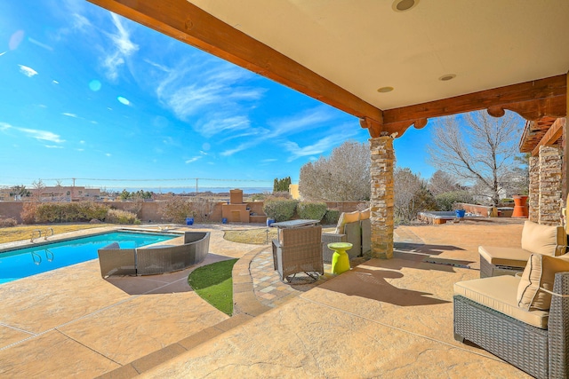 view of patio featuring a fenced in pool