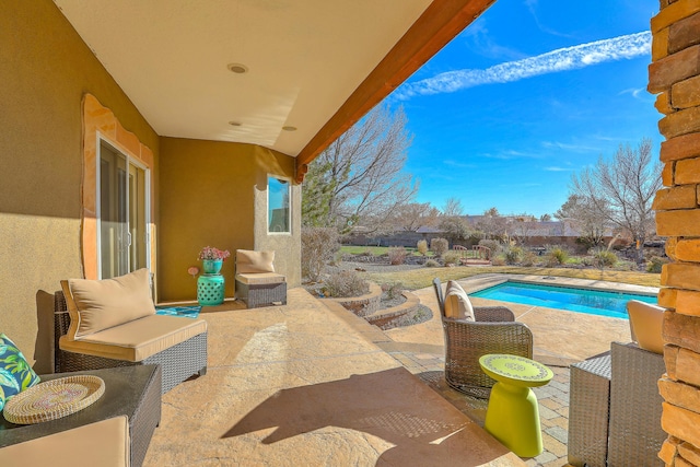 view of patio with an outdoor pool