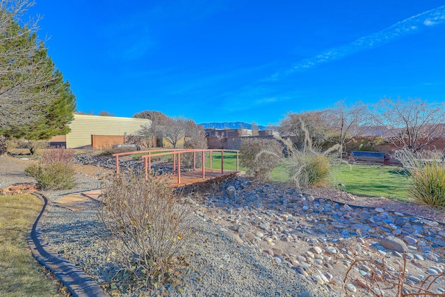 view of yard with a mountain view