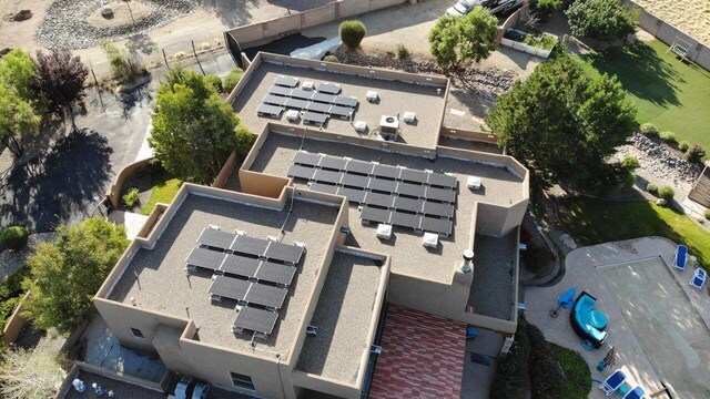 rear view of house featuring a mountain view, an outdoor living space, a balcony, and a patio