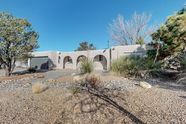 view of adobe home