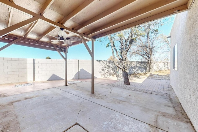 view of patio featuring ceiling fan