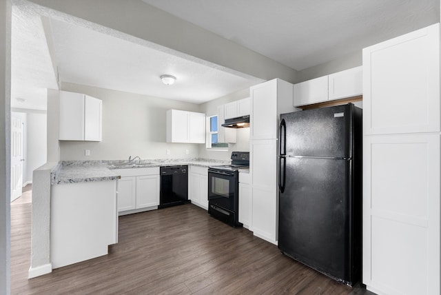 kitchen featuring black appliances, sink, light stone countertops, dark hardwood / wood-style flooring, and white cabinetry