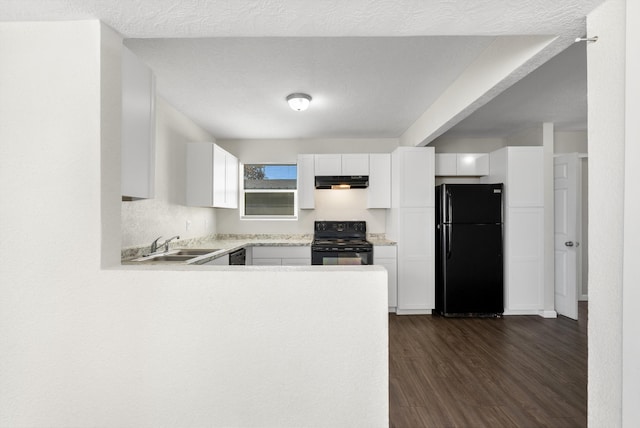 kitchen featuring white cabinets, sink, dark wood-type flooring, and black appliances