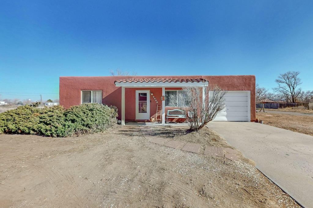 view of front of home with a garage