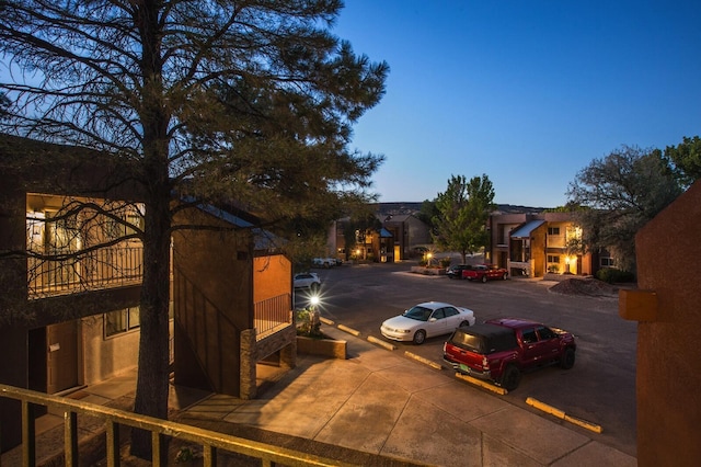 view of parking at dusk