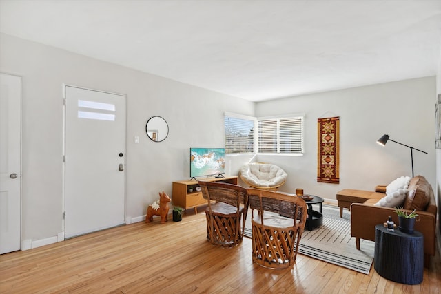 foyer entrance with light hardwood / wood-style floors