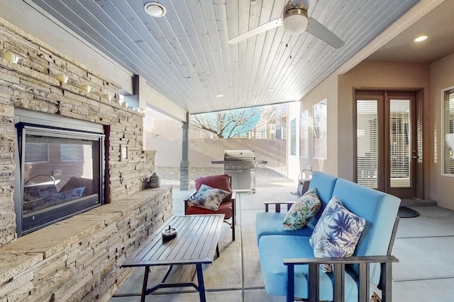 view of patio / terrace with outdoor lounge area, ceiling fan, and a grill