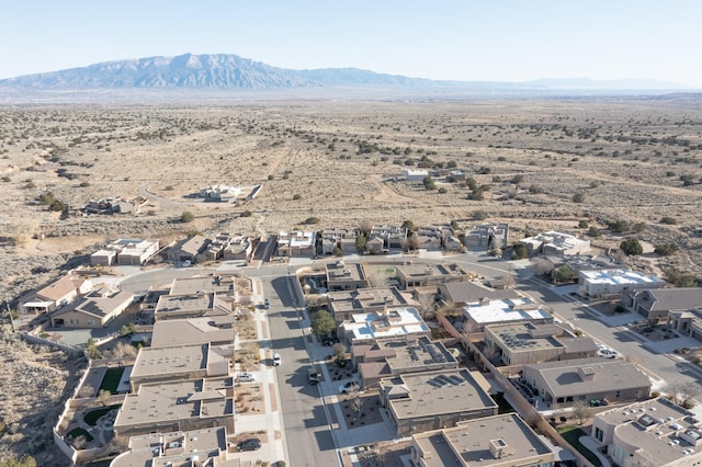 drone / aerial view featuring a mountain view