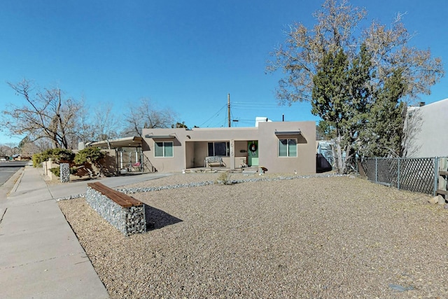 back of property featuring a patio area