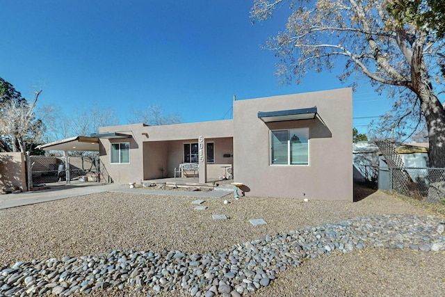 rear view of house featuring a patio area