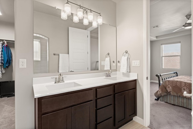 bathroom with vanity and ceiling fan