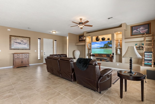 living room with ceiling fan