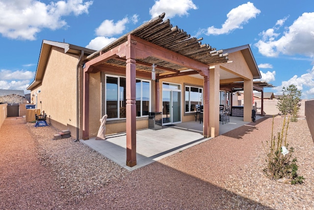 back of house featuring a pergola and a patio