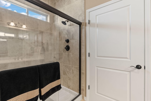 bathroom with an enclosed shower