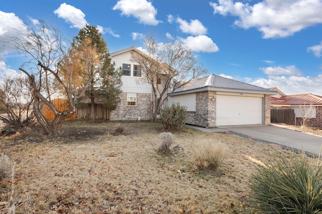 view of front of home featuring a garage