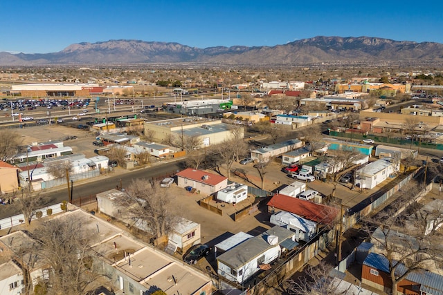 birds eye view of property with a mountain view