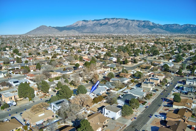 birds eye view of property with a residential view and a mountain view