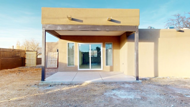 back of house featuring a patio area