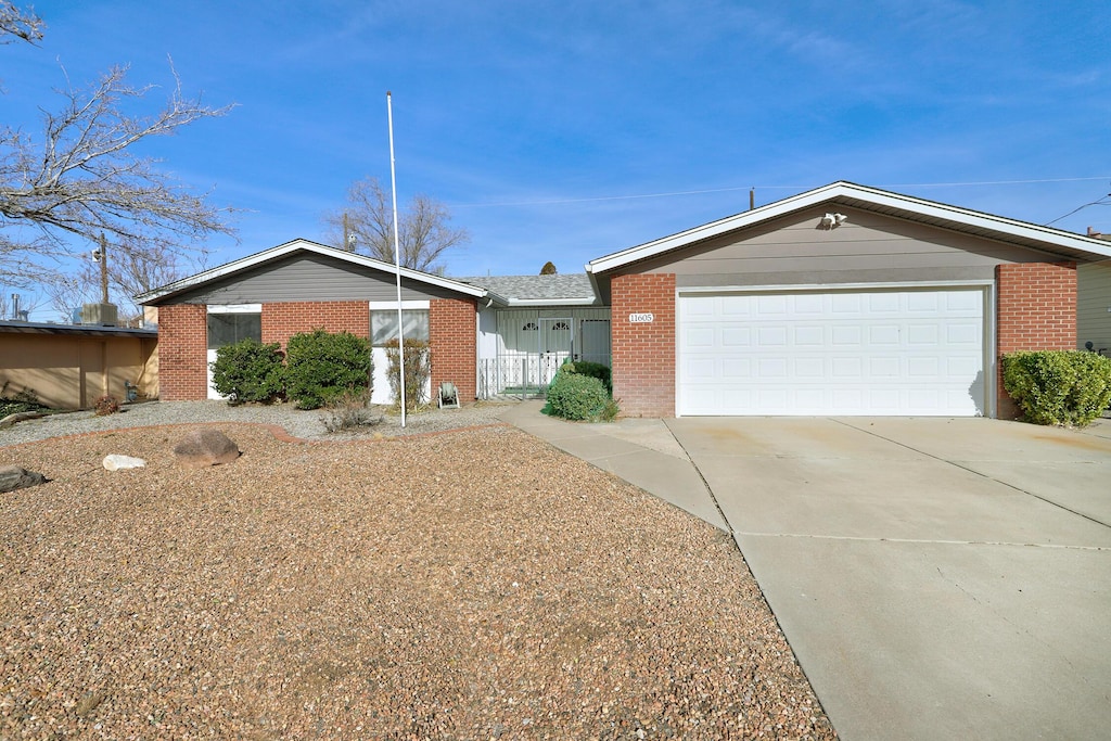 ranch-style home with a garage