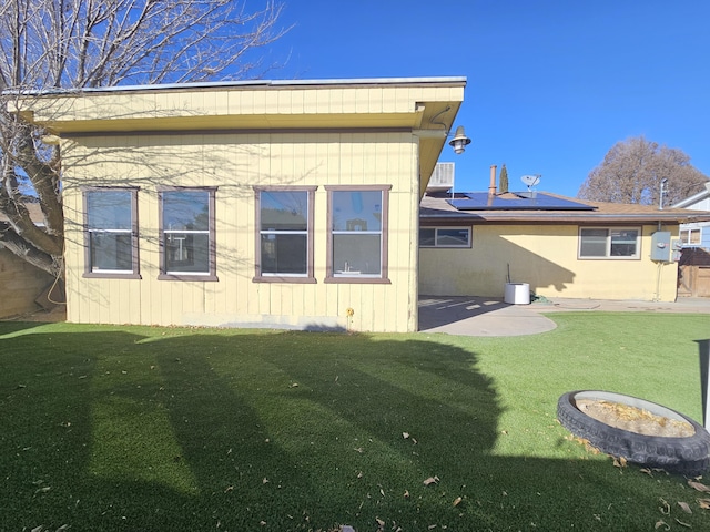 view of outdoor structure with a lawn