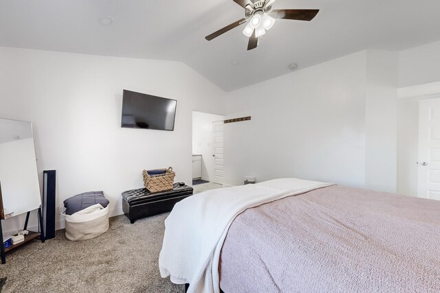 carpeted bedroom with ceiling fan and lofted ceiling