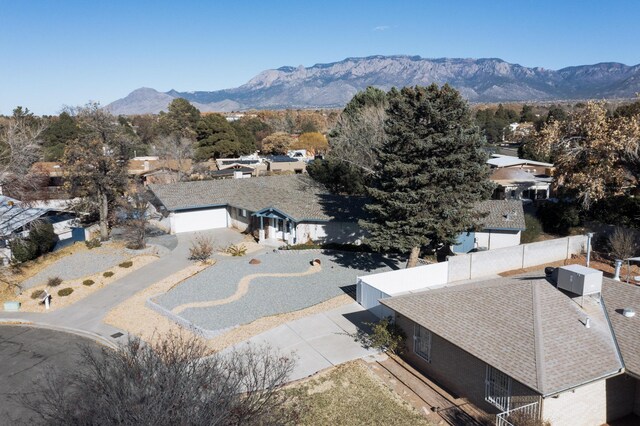 drone / aerial view featuring a mountain view