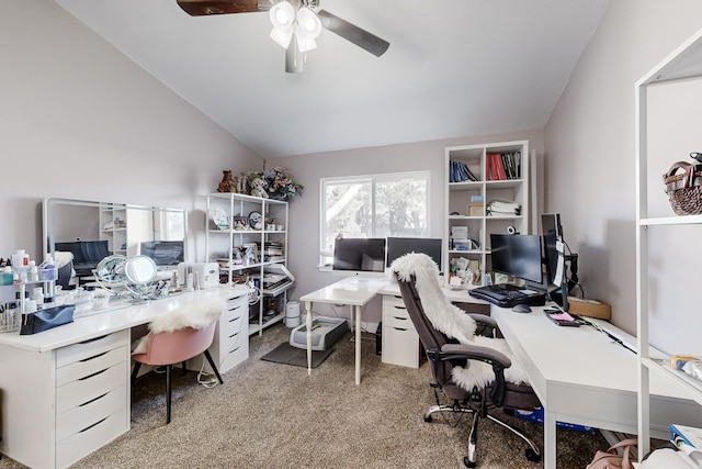 office area with light carpet, ceiling fan, and lofted ceiling