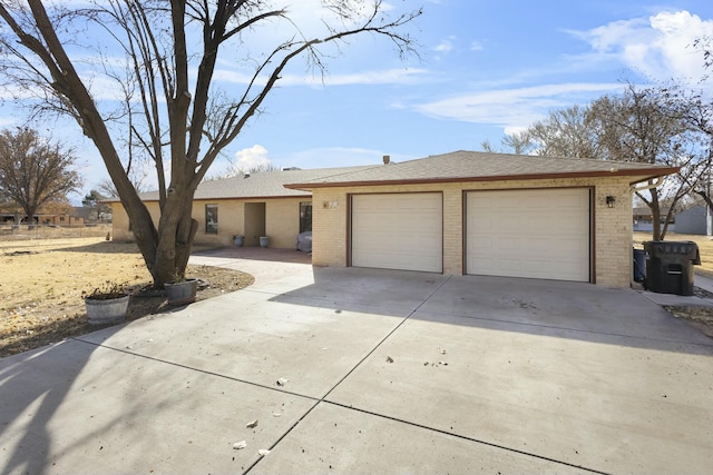 single story home with a garage