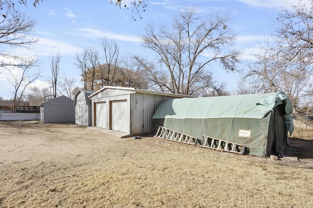 view of outbuilding with a garage