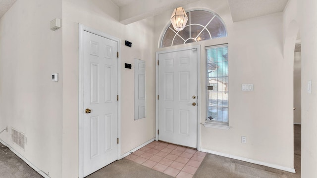 foyer entrance featuring tile patterned floors